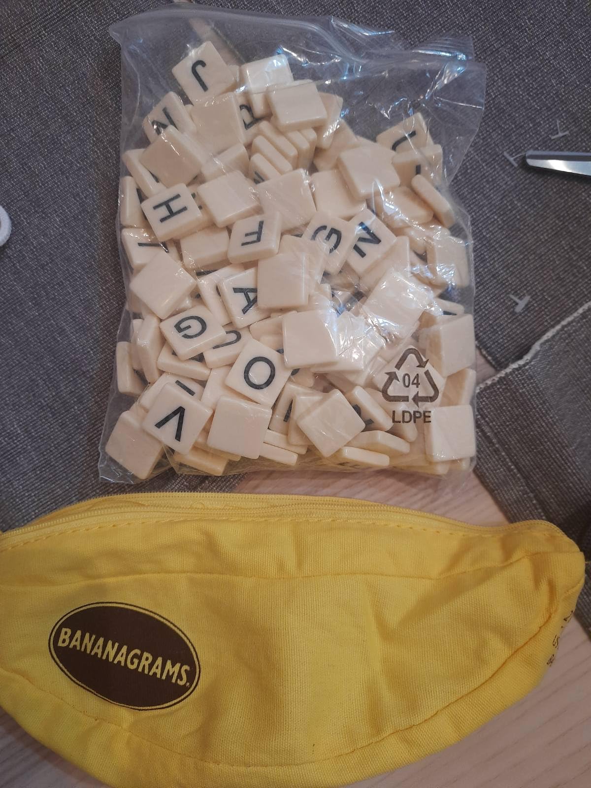 Bananagrams Classic Word Game, 144 Tiles in Banana Pouch, Travel Game | Fast-paced spelling & anagram game for 1-8 players; portable pouch, educational wordplay for kids and adults ages 7+ customer photo 1
