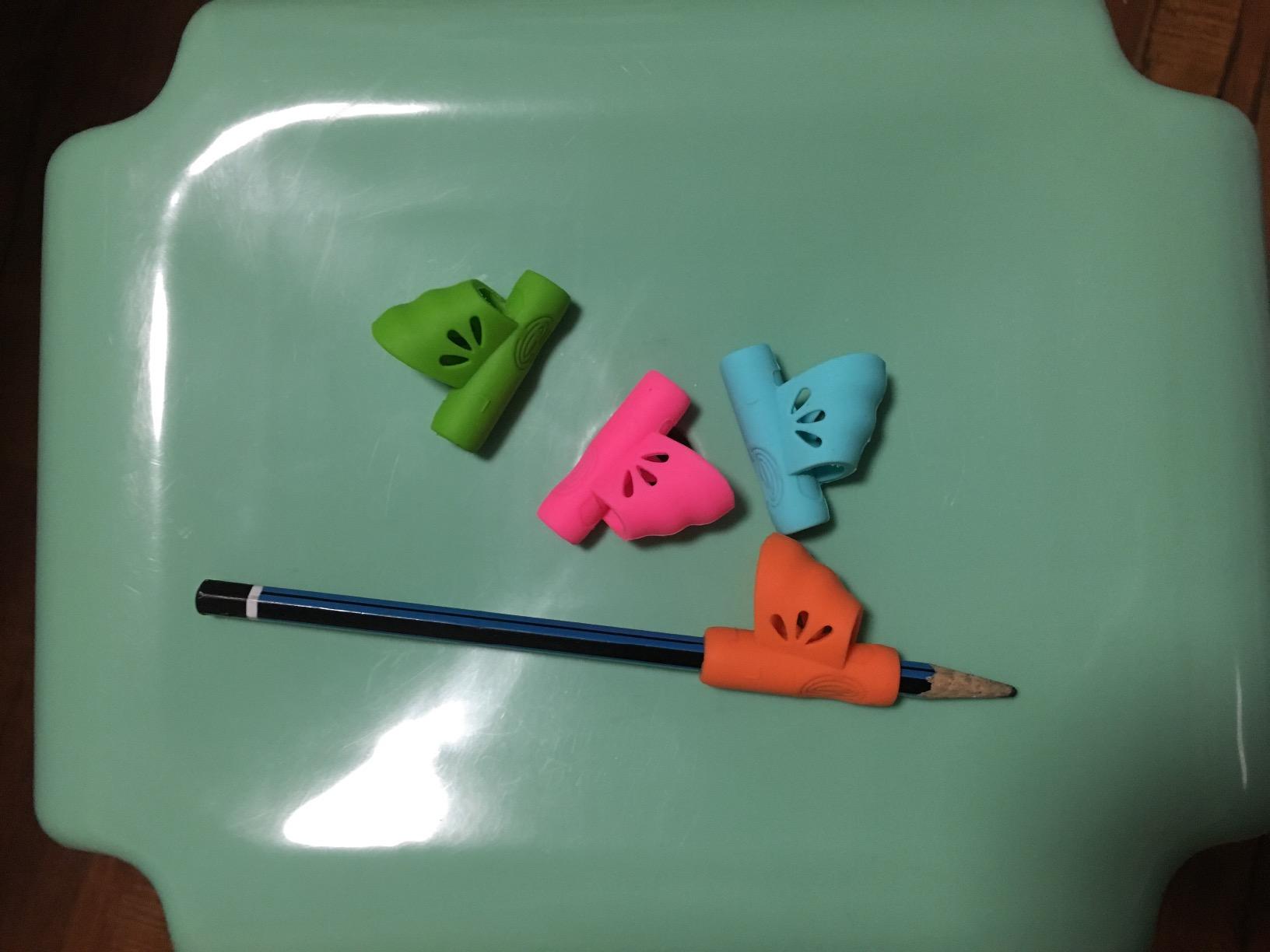 Firesara Left-Handed Training Grips, Original Butterfly Pencil Holder Correction Writing Aid Grip for Kids Handwriting Special Needs Preschoolers Children Adult Lefties Assorted Colors (4PCS) customer photo 2
