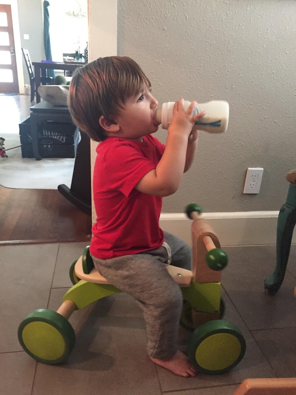 Hape Scoot Around Ride On Wood Bike | Award Winning Four Wheeled Wooden Push Balance Bike Toy for Toddlers with Rubberized Wheels, Bright Green customer photo 2