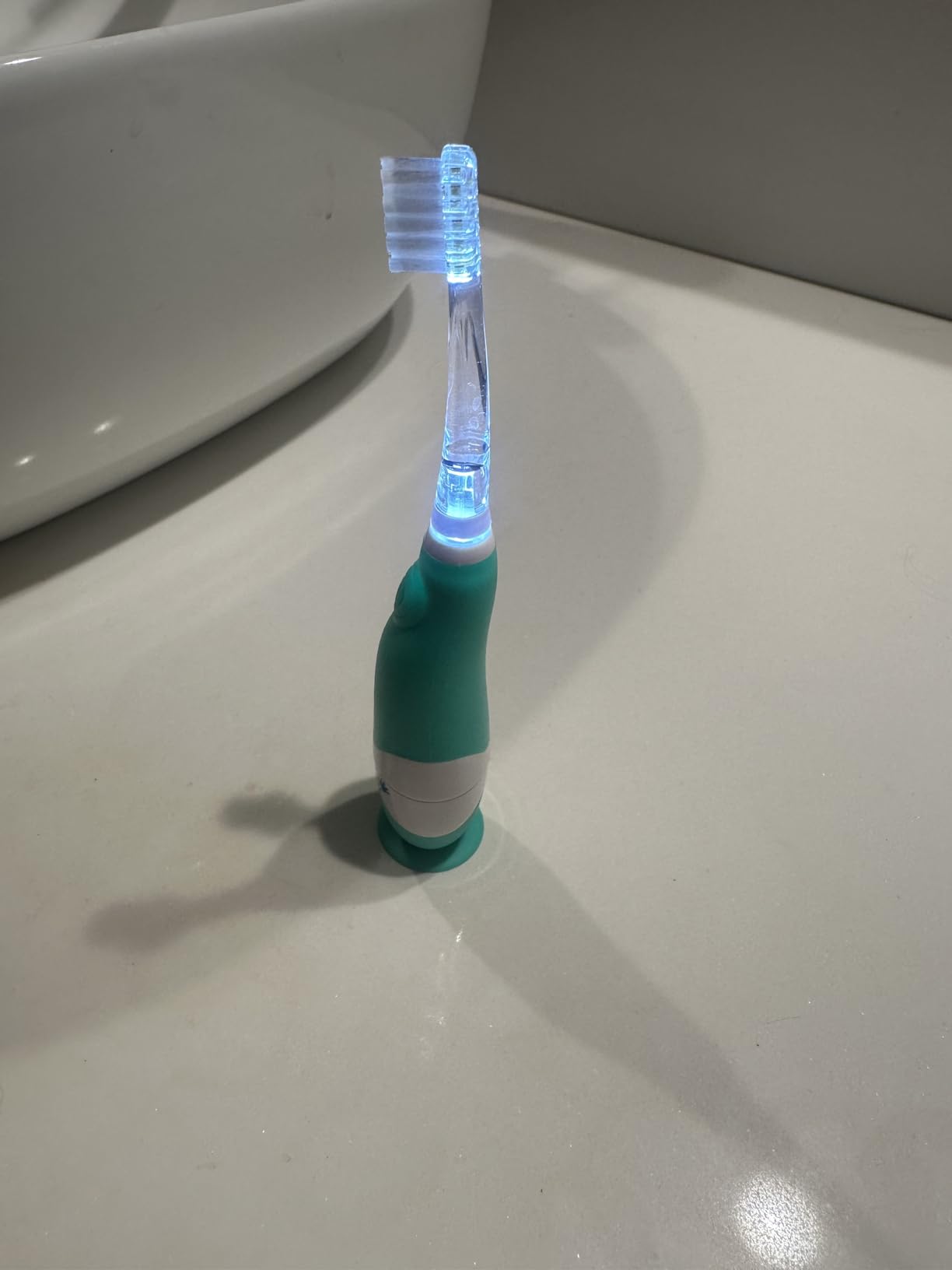 brush-baby BabySonic Infant and Toddler Electric Toothbrush for Ages 0-3 Years - Smart LED Timer and Gentle Vibration Provide a Fun Brushing Experience - Includes 2 Sensitive Brush Heads (Teal) customer photo 1