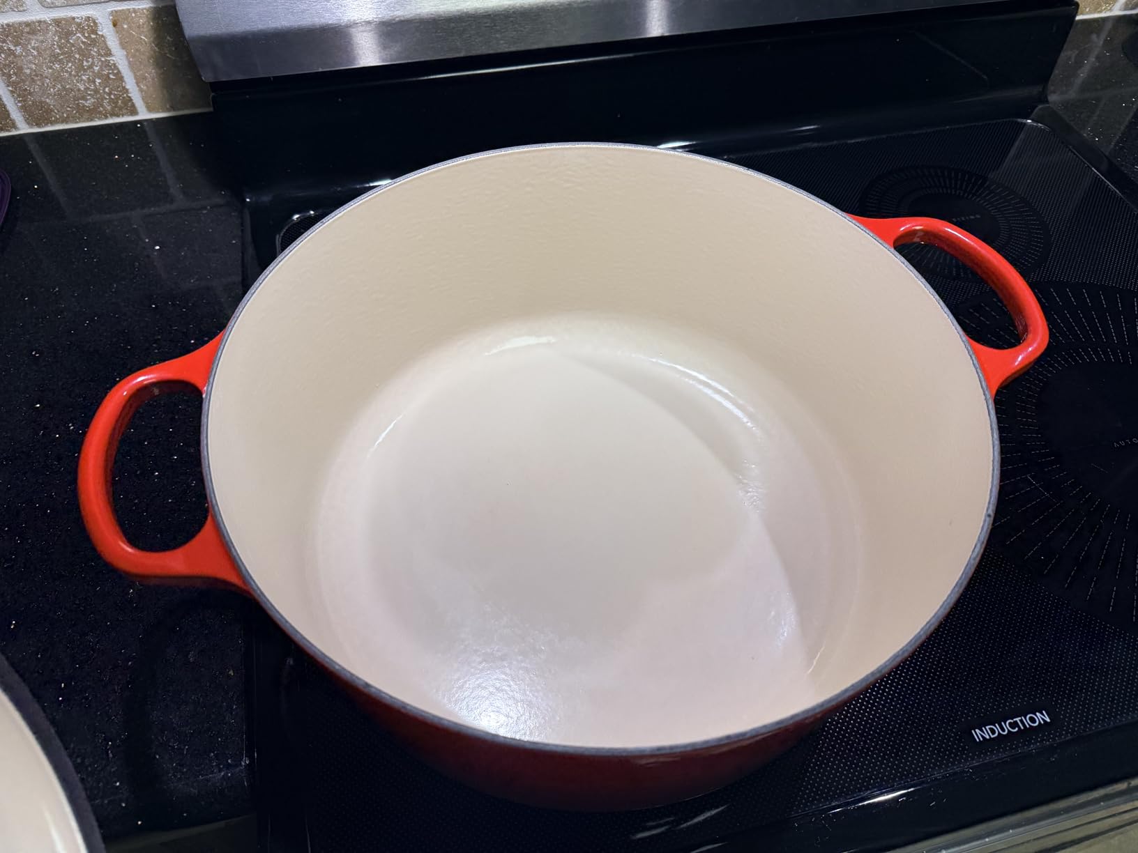 Le Creuset Enameled Cast Iron Round Dutch Oven, 7.25 qt., Cerise customer photo 1