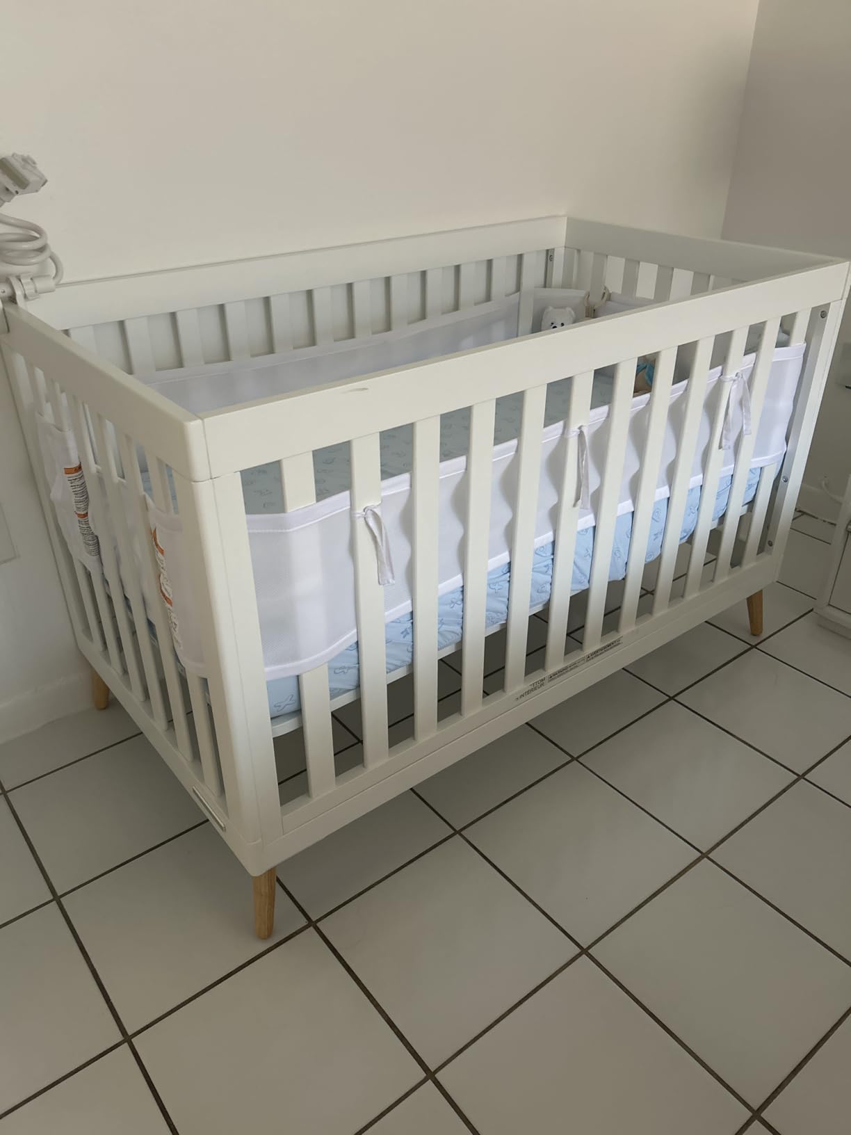 Delta Children Essex 4-in-1 Convertible Baby Crib, Bianca White with Natural Legs customer photo 1