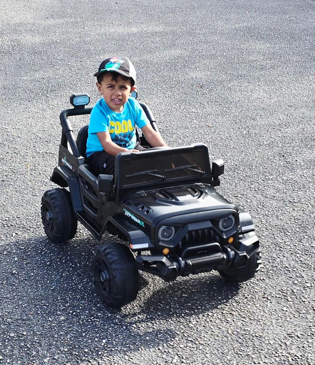 MINIATURE MOTORS 12V Kids Electric Ride on Truck Car Remote Control, Twin 35W Motors 3.5MPH Max Speed, Bluetooth Music Player, 4 Wheels Suspension LED Lights Safety Belt, Gift for Boys & Girls-Black customer photo 2