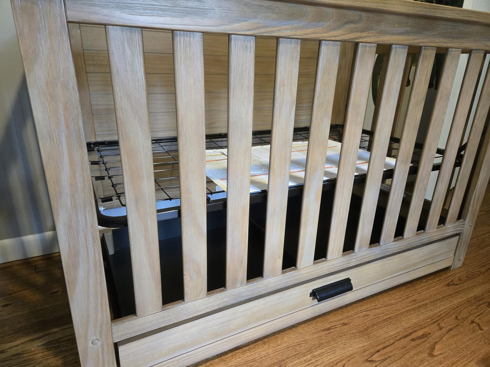 Delta Children Simmons Kids Caden 6-in-1 Convertible Crib with Trundle Drawer, Greenguard Gold Certified, Aged Oak customer photo 1